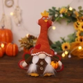 Gnome plush turkey figurine with long beard holding a pumpkin for Thanksgiving decor - Female Glowing Turkey Gnome Ornament