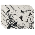 Set of four placemats featuring black and white gothic crow and bare tree branch design - Black And White Ink Crow Placemats / Placemat
