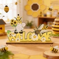 Detail of wooden gnome welcome sign with bee and sunflower for table decor - Welcome Style (A Wooden Ornament)