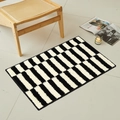 Plush bathroom mat with black and white geometric stripes in a cozy home setting - 40×60CM / Black