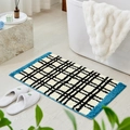 Dikke pluche badkamermat met zwart-wit geruit patroon en blauwe harige randen - S / Blauw