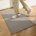 Zerbino intrecciato grigio e beige con trama a righe su parquet chiaro - 50x80cm / Grigio