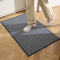Minimalist deep blue entry doormat with vertical texture on wood floor background - Blue