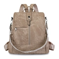 Minimalist khaki PU leather women backpack with stylish geometric woven strap in main view - Khaki