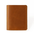 Detailed view of vintage crazy horse leather wallet with handmade orange stitching - 8031 Vertical Brown