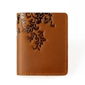 Detail of vintage brown crazy horse leather wallet featuring embossed leaf texture patterns - 8031 Vertical Brown Leaf
