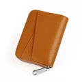 Detail of caramel leather card wallet showing pebble grain texture and card slots - Caramel color