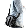 Vertical black genuine leather crossbody bag for men with stylish white stitching details - Black
