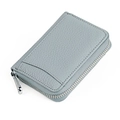 Detailed close-up of grey-blue genuine leather coin purse with silver metal zipper closure - Light Blue