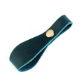 Close-up of green crazy horse leather strap with a vintage brass snap fastener for camping - Blue