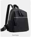 Side view detail of black lychee grain faux leather backpack with silver zippers - Black