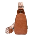 Close-up of brown faux leather sling bag featuring a geometric patterned wide strap - Brown