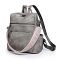 Zaino grigio in tela con tracolla ricamata e tasche multiple per uso versatile in viaggio - Grigio
