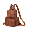 Brown vintage PU leather multi-pocket backpack with matte texture and antique zippers - Caramel color