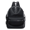Detail of black faux leather backpack with pebble texture and detachable shoulder strap - Black