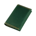 Macro detail of dark green crazy horse leather card holder with contrast orange stitching - Green