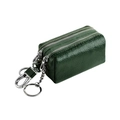 Dettaglio portachiavi in pelle martellata verde scuro con doppia zip e gancio argento - Verde