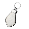 Close-up of white lychee leather car keychain with silver metal ring and beige stitching - White