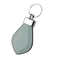Macro detail of light blue lychee pattern leather keychain with neat white stitching - Sky Blue