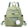 Mint green PU leather backpack for women with a white fuzzy pompom charm and front pocket - Green