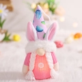 Pink Easter gnome with glowing belly, bunny ears, and braided beard holiday decor - Leaf Print Pattern / Pink