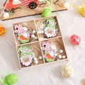 Easter wooden gnome pendants set with rabbit ears and colorful eggs in a wooden box - Gnome Holding Carrot Style