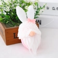Pink Easter gnome plush with rabbit ears and pink bow detail for festive home decor - Pink