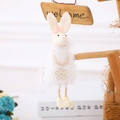 White plush Easter bunny hanging ornament with pink bow and rustic rope accents - White