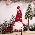 Red Christmas gnome plush with HO HO HO hat decoration and festive snowy background - Red Style (HO HO HO)