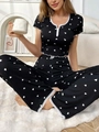 Women's black pajama set with white heart print, short sleeves and lace trim detail - S / Black with White Heart