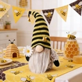 Bee festival gnome plush with yellow striped hat holding a daisy in home setting - Knitted Striped Hat Style (X-XX13)