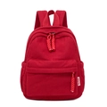 Winter red corduroy small backpack with multi-pocket design and decorative woven zip pulls - Red