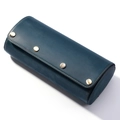Three-slot leather watch roll in navy blue with brown stitching and snap closures - Blue