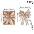 Glittering cream and gold Christmas bow ornament with precise weight and size dimensions - Christmas Flower Style