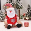 Santa Claus knitted candy bag with heart window and Christmas embroidery detail - Santa Claus Style