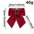 Fiocco di Capodanno in velluto rosso con bordo glitterato dorato su sfondo bianco - Piccolo Rosso con Bordo Dorato