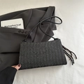 Minimalist black woven straw underarm bag with contrast knot and thin leather strap - Black With Pendant