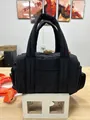 Sac à main matelassé noir avec poignées rembourrées et bandoulière réglable pratique - Noir