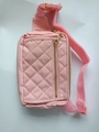 Pink quilted nylon fanny pack with adjustable strap and golden zipper detail - Pink