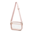 Macro shot of pink zipper detail and transparent PVC material on crossbody bag - Pink