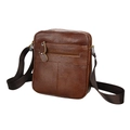 Brown lychee grain leather crossbody bag with two front zipper pockets and metal hardware - 8-Inch / Brown