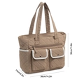 Khaki quilted tote bag with white trim featuring front pockets and size measurements - Camel