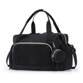 Detalle de bolso cambiador negro impermeable con bolsillo trenzado y cremalleras oro - Negro