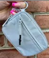 Close-up of waterproof nylon mini backpack keychain with silver metal ring and zippers - 15*9*2cm / Sky Blue