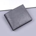 Men's bifold wallet in black litchi pattern leather with minimalist stitching - Black