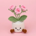 Handmade crochet pink roses in a white pot with a cute face and brown legs - Gradient Pink 3 Bubble Roses (White Pot with Feet)
