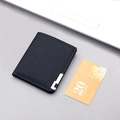 Slim black canvas wallet for men featuring a metallic corner detail and foldable design - Black