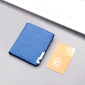 Slim navy canvas card holder wallet for men with silver metal trim in office setting - Blue