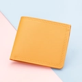Slim bright yellow bi-fold wallet for women with high-quality vegan leather and stitching - Yellow