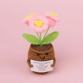 Handmade crochet lily of the valley potted plant with pink flowers and smiley face pot - Pink Lily of the Valley